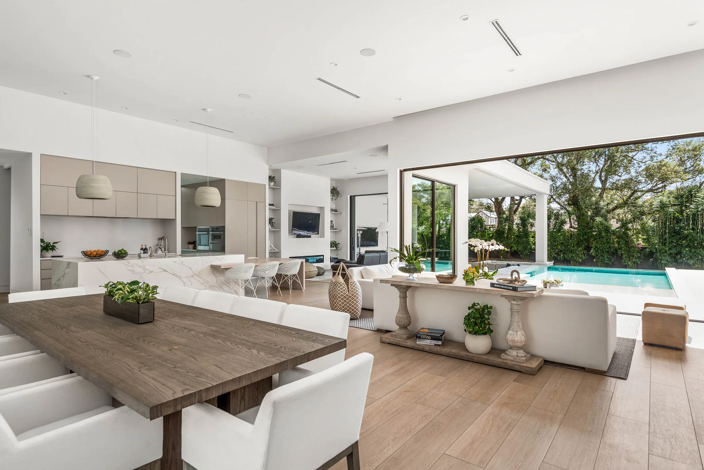 Wood dining table in the open kitchen and living room.